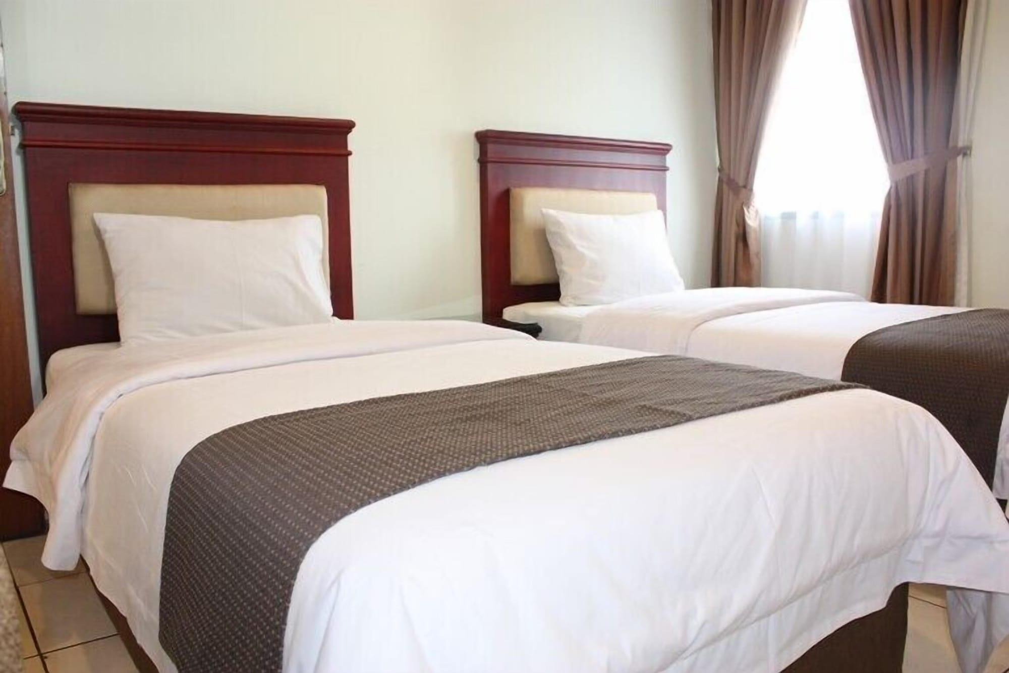 Travellers Suites Serviced Apartments Medan Kültér fotó