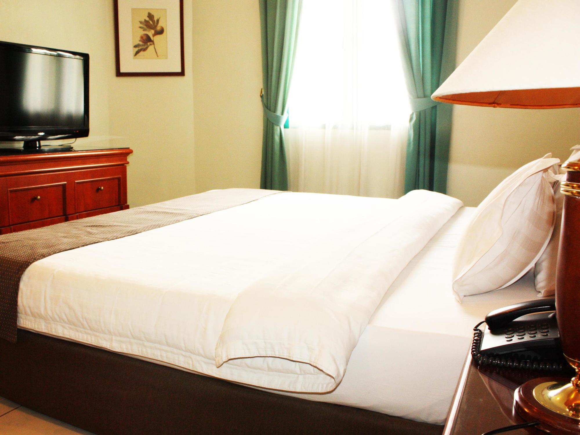 Travellers Suites Serviced Apartments Medan Kültér fotó