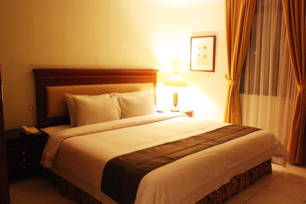 Travellers Suites Serviced Apartments Medan Szoba fotó