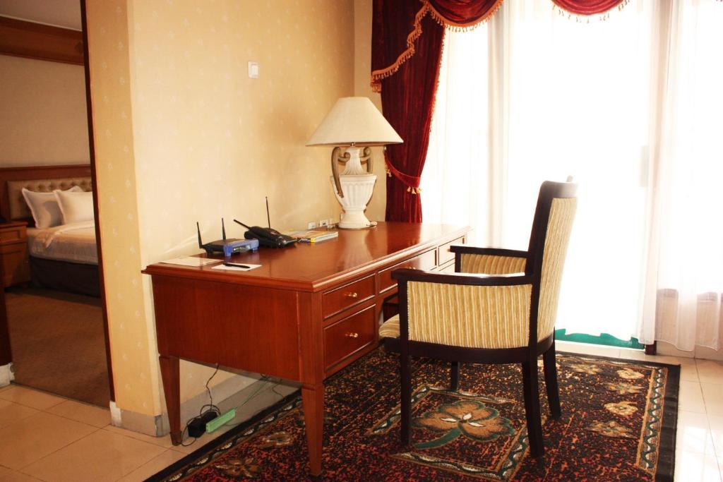 Travellers Suites Serviced Apartments Medan Szoba fotó