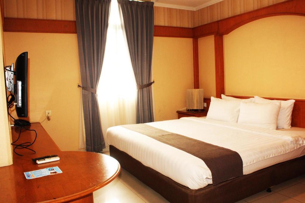Travellers Suites Serviced Apartments Medan Szoba fotó